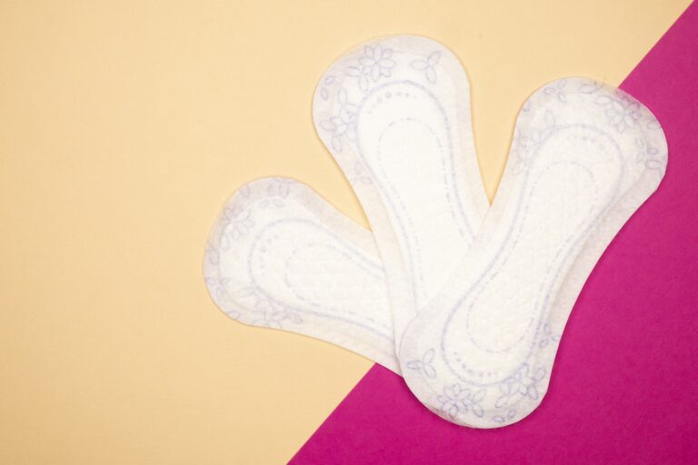 Menstrual pads on a colorful background.
